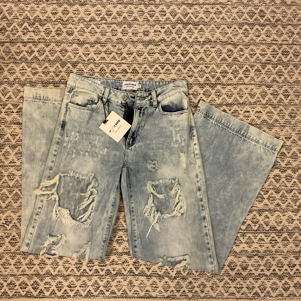 Distressed Light Blue Jeans